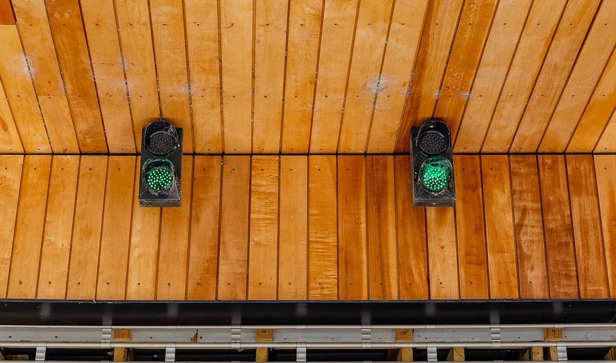 Green lights above the garage door to Deloitte Building